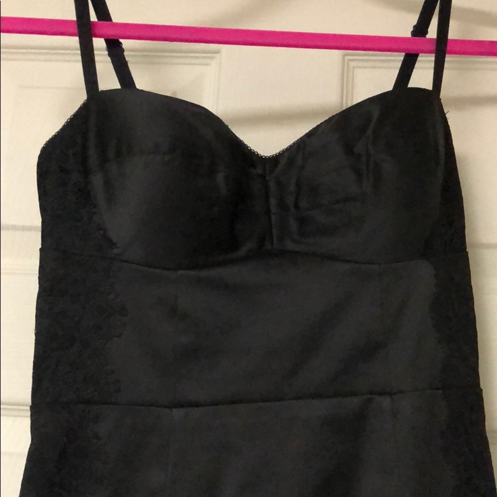 Black sleek bodycon dress by Guess.